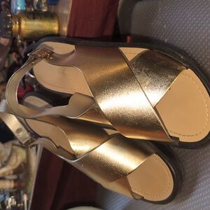 AVAILABLE - Source unknown Gold flate sling back sandles. Size 7